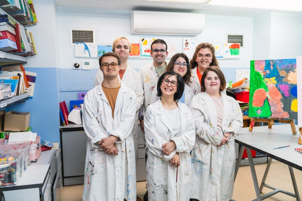 friends with different disability in a painting class