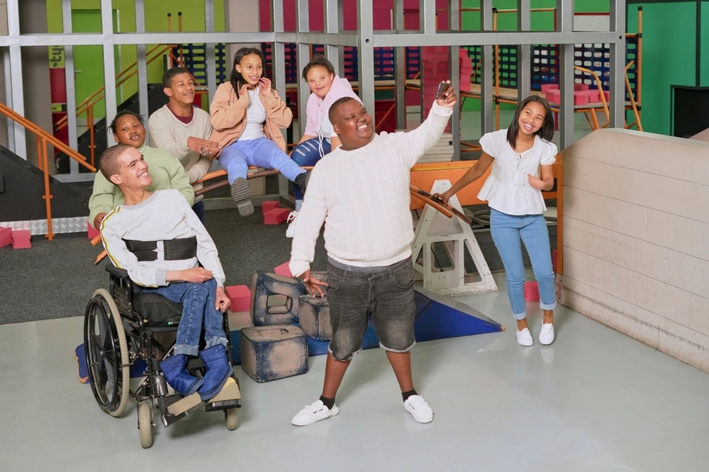 group of friends with different disabilities in a disability support centre