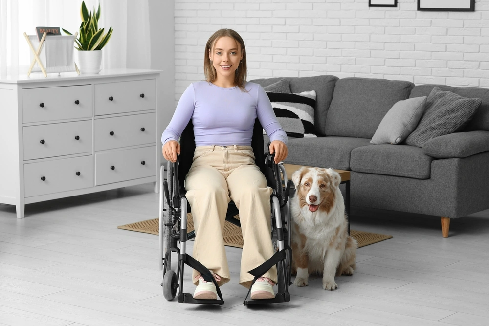 young women on wheelchair in home