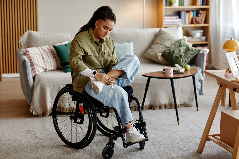 disabled women on wheelchair in her home
